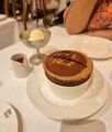 Sharing chocolate souffle dessert at Chez Rose restaurant review Mayfair